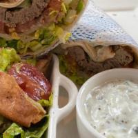 Gyro · Beef and lamb, tzatziki, feta cheese, lettuce, onion, tomato and a side salad