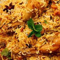 Kabsa · Basmati rice served with choice of meat and house salad, Sudanese style.