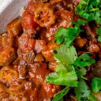 Veggie Okra · Savory made of tomatoes stew with onions, garlic, jalapenos, warm spices/herbs, and spike wi...