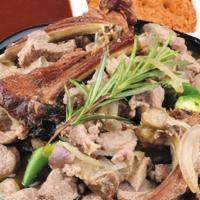 Lega Tibs · Tender beef sautéed with rosemary herb, onion, and green peppers mixed with seasoned butter;...