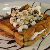 S’Mores French Toast · Two peace’s French toast dipped in graham crumbs, stuffed with hazelnut chocolate, marshmall...
