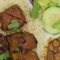 Lamb Kabob · 5 pieces Tender marinated lamb in house spices, grilled and served with basmati rice, chickp...