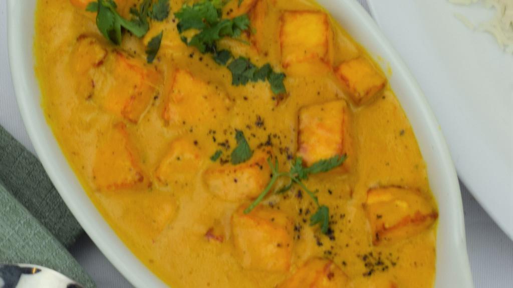 Shahi Paneer · Cubed cottage cheese simmered in creamy tomato based sauce and fresh herbs and spices.