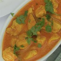 Chicken Curry · Chicken cooked in house curry sauce and spices, served with basmati rice.