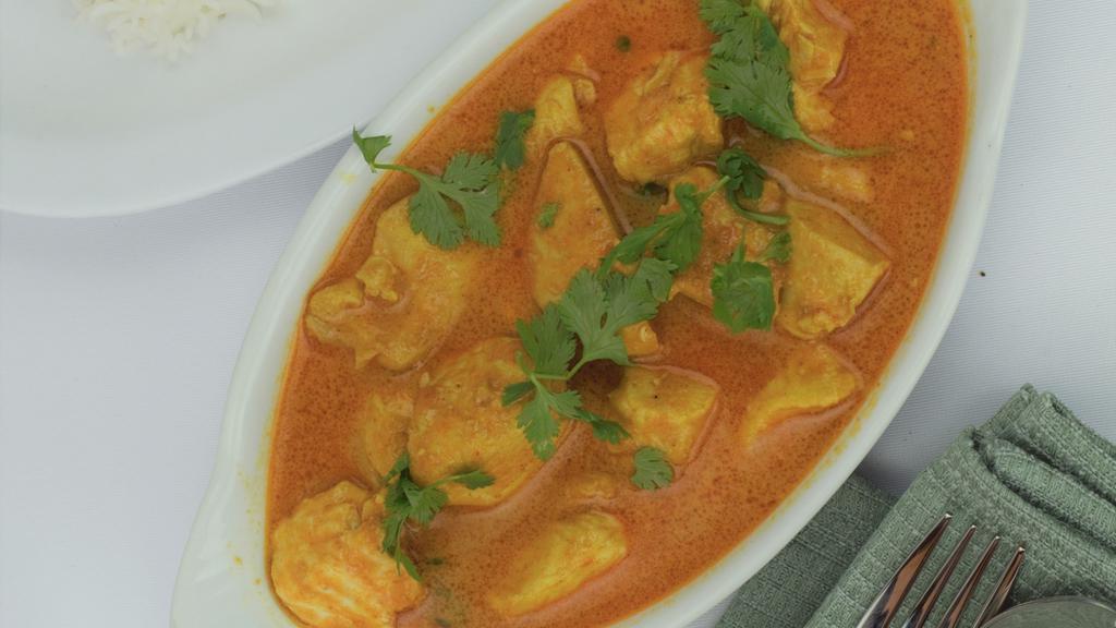 Chicken Curry · Chicken cooked in house curry sauce and spices, served with basmati rice.