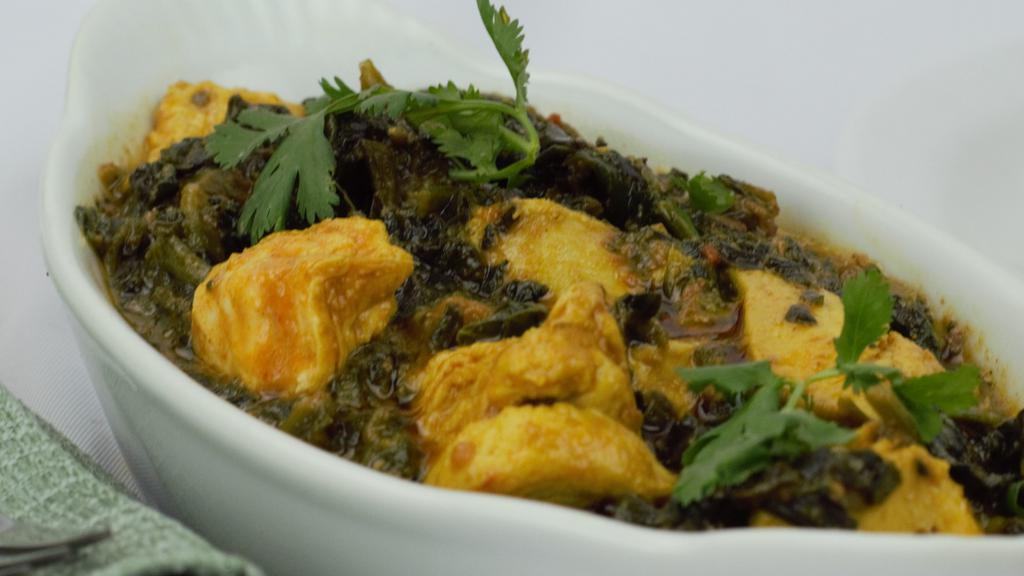 Chicken Saag · Chicken cooked with spinach and house spices, served with basmati rice.