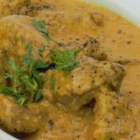 Lamb Korma · Lamb cooked with almond sauce, dried fruits and house spices, served with basmati rice.