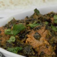 Lamb Saag · Lamb cooked with fresh spinach and house spices, served with basmati rice.