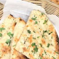Garlic Kulcha · Light bread stuffed with minced fresh garlic.