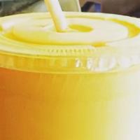Mango Lassi · Sweet blended yogurt drink with mango pulp.