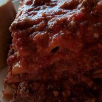 Lasagne Alla Bolognese · Baked lasagne with meat and bechamelle sauce.