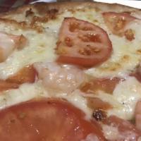 Scampi · White pizza, shrimp, sliced tomato, garlic.