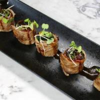 Beef Negamaki · Japanese styled seared beef, thinly sliced, scallions, teriyaki soy sauce