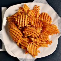 Seasoned Waffle Fries · (6 oz.) Lightly breaded, thick-cut waffle fries, seasoned with our house secret spice and de...