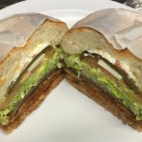 Torta · Hot sandwich with choice of meat, refried beans sour cream, cheese, lettuce, tomato, avocado...