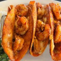 Shrimp Birria Tacos · ( 3 )tacos cooked in birria sauce filled with (4) shrimp each & cheese with side of onions, ...