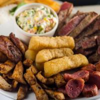 Mixed Barbecue Comida · . Picanha, pork chops, chicken, sausage, rice, beans, fries, salad and salsa with tomato and...