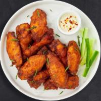 On The Wings Of Love · Fresh chicken wings breaded and fried until golden brown. Served with a side of ranch or ble...
