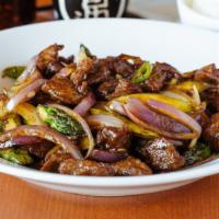 Mongolian Lamb · Spicy. Served with steamed rice and brown rice.