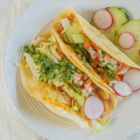 Mexican Street Tacos · your choice of meat on a Mexican tortilla topped with onions, cilantro, lime on the side and...