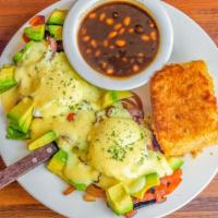 California Eggs Benedict · A grilled English muffin topped with grilled tomatoes, Bermuda onions, fresh avocado, two po...