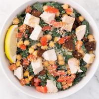 Thrive Kale Caesar Salad · Shredded kale, parmesan cheese, chickpeas, diced tomatoes, vegan caesar dressing, lemon wedg...