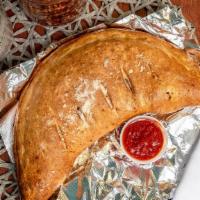 Cheese Calzone · Our secret sauce, mozzarella, and provolone cheese. Wrapped in our fresh dough.