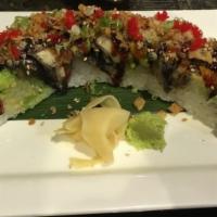 Flower Dragon Roll · Shrimp tempura roll with cucumber avocado, eel, masago, scallion, crunchy, and eel sauce on ...