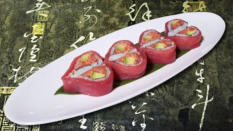 Sweet Heart Maki · Spicy tuna and avocado roll wrapped with fresh tuna. Heart shaped. Brown rice or soybean sushi available upon request.