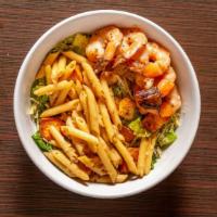 Shrimp & Pasta Caesar · Shrimp and penne pasta sautéed in white wine and garlic served over a tossed caesar salad