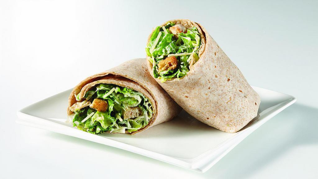 Chicken Caesar Wrap (Large) · Grilled Chicken, Romaine Lettuce, Shredded Parmesan Cheese, Home-Style Croutons and our Creamy Caesar salad Dressing.