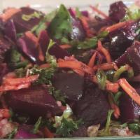 Beet Salad · Cooked beets, cabbage, carrots, romaine lettuce, parsley, lemon juice, pomegranate, garlic a...