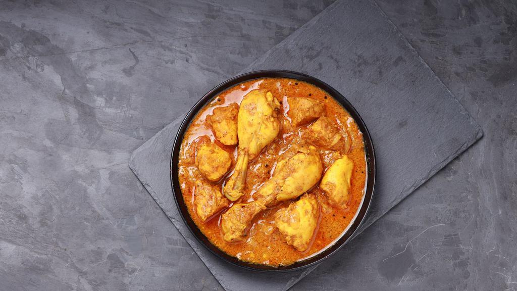 Curry Chicken · Fresh slow cooked chicken in our secret blend of Caribbean seasoning.