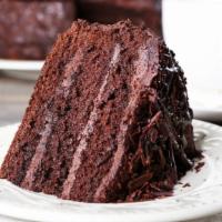 Chocolate Cake · A slice of our fresh made decadent chocolate sponge cake.