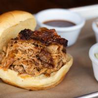 Chopped Chicken Sandwich · Seasoned and smoked chicken thighs, chopped. All sandwiches come with house made coleslaw an...