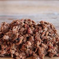 Pound Of Brisket · A pound aged Angus Texas style (salt and pepper only) smoked brisket. Served chopped with yo...