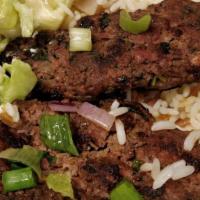 Kafta Kabob Plate · Ground marinated beef & lamb. Served with rice pilaf, Greek salad & pita bread.