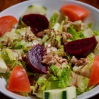 Tasty Salad · Baby romaine, toasted walnuts, cucumber, beets, balsamic vinaigrette.