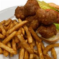 Shrimp Po'Boy · Crisp seasoned and fried shrip on a hoagie bun with special sauce. Served with fries.
