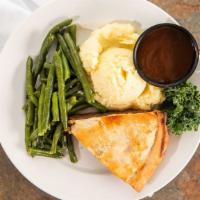 French Meat Pie · Homemade French meat pie served with mashed potatoes and vegetable of the day