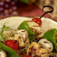 Grilled Chicken Kabob Dinner · Served with grilled green pepper, onion, tomato, rice and side.