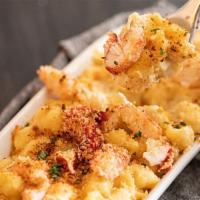 Mac & Cheese · Cavatappi butter noodles in hot cheese sauce.