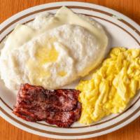 Two Eggs With Meat And Grits · Beef Bacon, Scrapple or sausage or Corned Beef Hash. Add Egg White, Cheese for an additional...