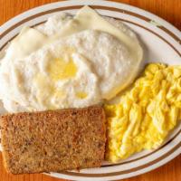 Two Eggs With Grits · Add Egg White, Cheese for an additional charge.