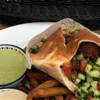 Falafel Pita Sandwich · Wrapped in a pita with lettuce, cucumber, tomato, and your choice of sauce.