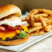 San Antonio Burger · 8 oz Angus beef with American & Swiss cheese, topped with sauteed mushrooms and a fried egg,...