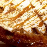 Cinnamon Bun Waffle · A cinnamon dusted waffle, smothered with a sweet cream cheese icing, and topped with caramel.