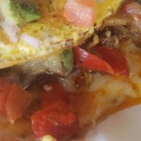 Fajita Omelette · Made with strips of juicy chicken and roasted peppers all spiced with fajita spices, and moz...