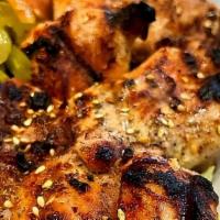Grilled Chicken Kabob · Lemon-garlic marinated chicken thighs. Choose to add lemon herb or bbq glazed. Served with o...