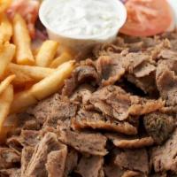 Beef Lamb Gyro Platter · Flavorful gyro meat served with tzatziki sauce and pickles.